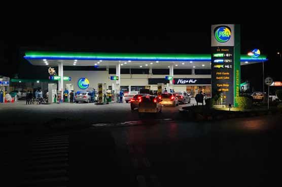 Fuel nozzles at a petrol station representing Pakistan's latest daily petroleum price revision.