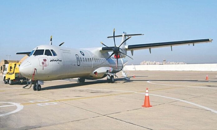 ATR Aircraft Powers Pakistan’s Northern Air Routes with Safe, Efficient Travel A modern ATR turboprop aircraft flying over Pakistan's snow-capped northern mountains with a winding river and green valley below, showcasing regional aviation in a rugged high-altitude landscape