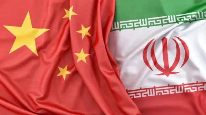 Iran Reportedly Agrees to Buy 300–400 Chinese Missile Systems Chinese missile systems displayed alongside the flags of Iran and China, symbolizing reports of a defense agreement between the two countries.
