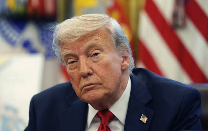 Trump's Rural Approval Hits New Low as Economic Concerns Grow U.S. President Donald Trump addressing supporters during a campaign event as new polling shows declining approval among rural voters