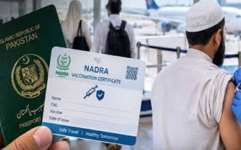 Passenger obtaining a NADRA-integrated vaccination card at an airport health office in Pakistan