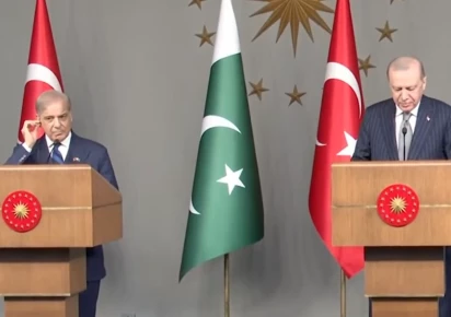 Turkish Defence Minister Yaşar Güler speaking at a Pakistan Defence and Martyrs Day reception in Ankara
